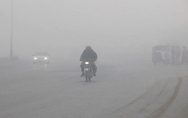 Driven-by-severe-frost,-dense-fog-breaks-traffic